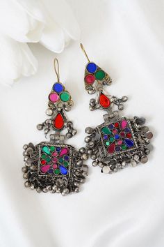 Afghan Jewellery Authentic Traditional Handmade Earrings. Get in contact with us if there is any queries regarding the item. Check out my page for other items. Help my small business and promote Afghan culture by placing an order with us. We have different kinds and types of Afghan Vintage Jewelleries! Your feedback is much appreciated. Please let us know the item arrived safely! Bohemian Tilla Dangle Earrings, Festive Vintage Chandbali Danglers, Festive Vintage Earrings With Oxidized Finish, Vintage Latkans Danglers For Festive Occasions, Vintage Danglers With Latkans For Festive Season, Festive Vintage Danglers With Latkans, Multicolor Traditional Jewelry For Vintage Collection, Traditional Multicolor Oxidized Earrings, Bohemian Meenakari Metal Earrings