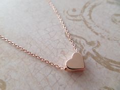 Rose gold heart necklace...dainty handmade by TiffanyAvenueBridal Cute Rose Gold Heart Necklace, Cute Rose Gold Heart Pendant Necklace, Cute Heart Pendant Necklace For Wedding, Cute Gold Heart Necklace Perfect For Gifts, Delicate Rose Gold Heart Necklace For Wedding, Rose Gold Dainty Heart Necklace For Valentine's Day, Delicate Rose Gold Heart Pendant Necklace, Dainty Handmade Heart Necklace, Dainty Rose Gold Heart Necklace For Valentine's Day