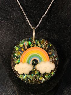 These stunning focal necklaces feature handmade clay rainbows surrounded by stars and shimmer and absolute wonderment! Have you always loved rainbows like I have? Well these are grown-up versions just for you!  Combined shipping available Fun Star-shaped Jewelry For Gifts, Rainbow Hypoallergenic Jewelry For Birthday, Rainbow Hypoallergenic Jewelry For Birthdays, Rainbow Color Necklace For Gift, Fun Rainbow Hypoallergenic Jewelry, Cute Nickel-free Rainbow Jewelry, Playful Rainbow Polymer Clay Jewelry, Adjustable Rainbow Charm Necklaces Gift, Fun Rainbow Colored Jewelry Gift