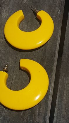 "Small Chunky Hoop earrings with gold tone clip on in bright cheery yellow. Earrings marked Hong Kong on clip on. Earrings measure 1-1/4\" hoop diameter And are approximately 1/2\" thick. YELLOW AND WHITE EARRINGS measure 2\" in diameter and are piercedno markings LARGE CHUNKY YELLOW EARRINGS measure a little over 1-3/4\" in diameter-pierced Thanks for browsing through our shop, have a wonderful day!" Vintage Summer Hoop Earrings, Vintage Yellow Earrings For Summer, Vintage Yellow Summer Earrings, Shabby Chic Jewelry, Chunky Hoop Earrings, Tray Display, Jewelry Summer, Yellow Earrings, Retro Jewelry