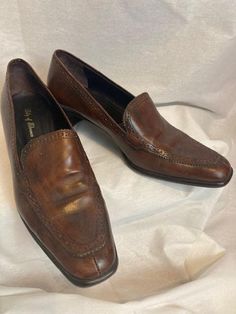 Vintage Italian Leather loafers with square toe, and mid sized heel.  Great condition, no issues.  US women's size 7. Vintage Slip-on Dress Shoes For Office, Retro Pointed Toe Loafers For Office, Classic Leather Shoes With Square Toe For Fall, Vintage Brown Pointed Toe Loafers, Vintage Slip-on Loafers For Work, Vintage Oxfords For Business In Fall, Vintage Almond Toe Loafers For Business, Vintage Business Oxfords For Fall, Vintage Slip-on Dress Shoes For Semi-formal Occasions