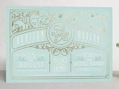 the wedding stationery was designed to look like an art deco ticket