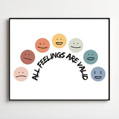 an art print with the words feelings are hard surrounded by smiley faces in different colors