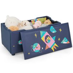 a toy storage box with stuffed animals in it and space theme on the lid,