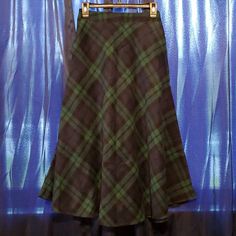 New With Tags! Ylingjun Plaid Wool Skirt. Green/Navy, High Elastic Waist, Long A-Line. Pockets On Both Sides, Side Zipper, Silky Lining. Size Xs. Thrifted Skirts, Rachel Skirt, Beige Midi Skirt, Cowgirl Skirt, Long Green Skirt, Black Wrap Skirt, Long Plaid Skirt, Flannel Skirt, Sparkly Skirt