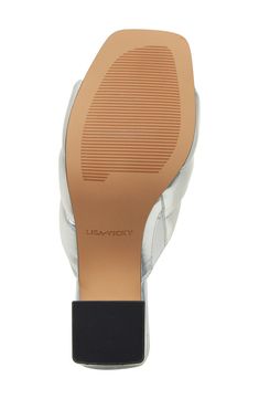 A quilted strap amplifies the contemporary sophistication of this striking block-heel sandal. 3 1/4" heel Slip-resistant sole Leather upper/synthetic lining/rubber sole Imported Block Heels With Padded Ankle, Modern Synthetic Sandals With Block Heel, Synthetic High Heels With Padded Ankle, Synthetic Mules With Reinforced Open Heel, Modern Synthetic Sandals With Stacked Heel, Synthetic Mules With Reinforced Heel, Modern Mules With Ankle Strap And Padded Heel, Modern Ankle Strap Mules With Padded Heel, Modern Mules With Padded Heel And Ankle Strap