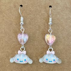 Sanrio Cinnamoroll Heart Earrings Dangle/Drop Style Earrings With Acrylic Cinnamoroll And Heart Charms. Cinnamoroll Charm Has Glitter Inside And Heart Charm Has Iridescent Sheen. Product Info Handmade By Me Measures About 1.8 Inches In Length Made With Acrylic/Plastic Charms And Silver-Colored Metal Earring Hooks Includes Rubber Earring Backings And Packaged With Display Card All New Materials Ready To Ship From Los Angeles, Ca Caution: Contains Small Parts That May Be A Choking Hazard To Small Cinnamonroll Sanrio Jewelry, My Melody Earrings, Cinnamoroll Jewelry, Cinnamoroll Earrings, Sanrio Earrings, Cute Merchandise, Sanrio Jewelry, All Out Anime, Plastic Charms