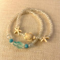 Set of two ocean life inspired bracelets, made with stretchy string, friendship bracelet style, perfect to wear together or share one with a friend! 🐢🐟 Shark Bracelet, Fish Beads, Marine Life, Bracelet Set, Fashion Bracelets, Birthday Wishes, Friendship Bracelets, Jewelry Bracelets, Beaded Bracelets