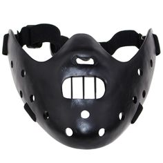 a black mask with holes on it