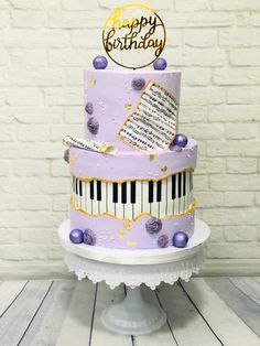 a purple cake with music notes on it