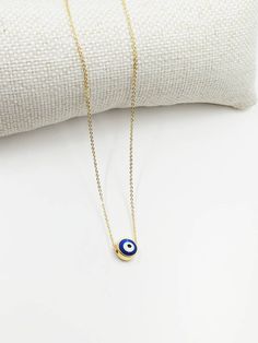 Dainty evil eye necklace is adjustable. This Turkish jewelry would be the great gift as a protection jewelry. Lenght of the nazar necklace is 45 cm (17.5 in) Blue Evil eye bead is 1 cm (0.3 in) For more evil eye necklaces, click the link below; https://www.etsy.com/shop/EyeDesignsbyGG?ref=search_shop_redirect&section_id=30285329 Adjustable Evil Eye Round Pendant Necklace, Adjustable Round Evil Eye Necklace, Nazar Necklace, Eye Gift, Turkish Eye, Protection Jewelry, Evil Eye Earrings, Turkish Jewelry, Blue Evil Eye