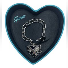 Guess Heart Bracelet Winter 2011 Silver Heart Bracelet For Valentine's Day Party, Silver Heart Charm Bracelet For Party, Black Metal Heart Bracelet As Gift, Elegant Black Heart Charm Bracelet, Valentine's Day Black Heart Charm Bracelet, Black Heart Charm Bracelet, Chunky Charm Bracelet, Shiny Bracelets, Guess Jewelry