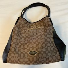 This Beautiful Brown And Tan Coach Purse Is A Great Addition To Any Collection. Purse Has 3 Sections Which Can Hold Everything You’ll Need. Comes With Shoulder Strap And Dust Bag. Purse Is Brand New And Has Never Left Its Bag. Item Resides In A Smoke Free Home. Coach Parker, Navy Bag, Black Leather Satchel, Blue Handbags, Leather Satchel Bag, Pink Handbags, Leather Handbags Tote, Tote Bag Purse, Coach Leather