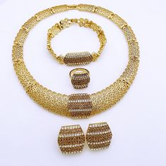 Afraic Jewelry-24k Dubai Gold Color Jewelry Set For Women Large Necklace Square Earrings Big Bracelet African Wedding Party Jewelry Model Number:3256804243222074 Product information: Material: alloy Color: 24K Gold Plated Product Package Details: 1 Set (Neckace, Bracelet, Earrings,Ring ) Dubai Gold Color Jewelry Set For Women Large Necklace Square Earrings Big Bracelet African Wedding Party Jewelry PRODUCT TOVERALL STYLE：Elegant simple fashionable and luxurious show your beautiful temperament in all directions, Show the charm of urban women.Regardless of daily work or shopping party will show personality for your whole outfit NO1 PRODUCT DETAILS: Handmade, finely polished, reliable quality, gives you beauty, but also offers you the most comfortable wearing experience. Other colors of the s Gold Alloy Jewelry For Party, Gold Alloy Party Jewelry, Gold Alloy Jewelry Sets For Party, Gold Alloy Party Jewelry Sets, Gold Plated Jewelry Sets For Anniversary, Gold-plated Jewelry Sets For Anniversary, Formal Gold Alloy Jewelry, Hand Set Gold Jewelry For Anniversary, Gold Costume Jewelry For Party