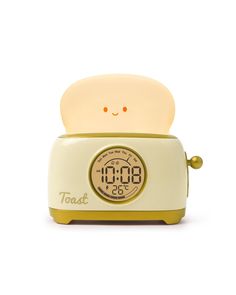 a toast alarm clock sitting on top of a table