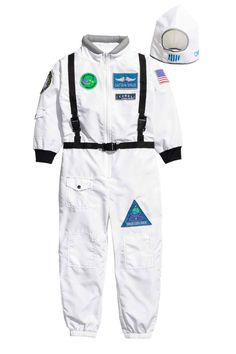 a white astronaut suit and hat with patches on it