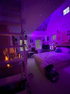 a bedroom with purple lighting in the ceiling