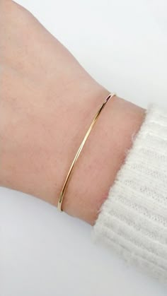 Dainty Thin Gold Cuff Bracelet, Simple Delicate Bangle Bracelet, Adjustable Cuff Bangle bracelet, Stacking bracelet, Dangle Charm bracelet, Gift for herDelicate thin cuff/bangle bracelet with a knot/macrame closure for adjustable length, a tiny heart or leaf charm and beautiful crystal beads. D E T A I L S: Cuff diameter: 62mmCuff thickness: 1.5mmThe cuff and charms are made of brass and they are gold plated with 14K gold. All metallic parts are lead free and nickel freeMacramé/Knot closure for Trendy Bracelets Gold, Delicate Golden Bracelet, Gold Band Bracelet For Women, Cute Gold Bracelets Simple, Gold Bangle For Women Classy, Simple Bracelets Gold, Gold Simple Bracelet, Simple Bangles, Adjustable Gold Bracelet