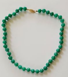 Necklace of beautiful emerald green jade beads. The beads are a good shade with some translucence and texture. 8mm beads individually knotted. 14k closure. 18" overall length. Excellent condition. No damage to any beads. Carefully packaged and sent to you USPS Priority Mail for $9.99 insurance and tracking included. Thank you for viewing our emerald jade necklace. Please visit our Etsy store for more beautiful jewelry and items of all kinds. 8mm Beads, Jade Necklace, Sarasota Fl, Wedding Jewellery Necklace, Jade Beads, Green Jade, Jade Green, Wedding Necklace, Chain Styles