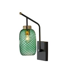 a green glass wall light with a black metal arm and bulb on the left side