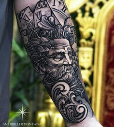 a man's arm with a clock on it and a face in the middle