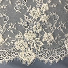 white lace with flowers on it