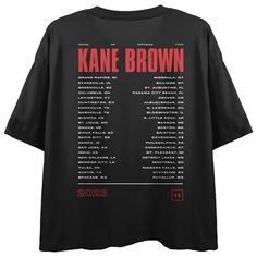 Step into the world of country music with this women's black Kane Brown crew short sleeve crop top. Featuring a captivating custom design, this officially licensed crop top showcases Kane Brown in front of bold red letters repeating his name. The back is adorned with a list of tour locations, making it a unique and personalized piece for fans. Made with combed ringspun cotton and lightweight jersey polyester, this crop top offers both style and comfort. Easily care for this trendy piece by machi Black Crew Neck Crop Top For Concert, Short Sleeve Crop Top For Music Festival, Black Graphic Print Band Merch Crop Top, Black Band Merch Crop Top With Graphic Print, Band Merch Graphic Print Crop Top For Concert, Black Graphic Print Crop Top For Concert, Band Merch Cropped T-shirt With Letter Print, Band Merch Crew Neck Crop Top For Streetwear, Streetwear Band Merch Crop Top With Crew Neck