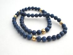 Blue Gemstone Vermeil Jewelry - This is a strand of 7mm lapis lazuli and gold over sterling silver beads. Necklace is 18.5" long, beads are 7.5 mm wide, hallmarked 925 Canada and weighs 37 grams. Gold Lapis Lazuli Beaded Bracelets With Round Beads, Classic Blue Round Beads Jewelry, Classic Blue Round Bead Jewelry, Blue Sodalite Round Beaded Jewelry, Gold Lapis Lazuli Jewelry With Polished Beads, Lapis Lazuli Beads, Vermeil Jewelry, Leaf Necklace, Cross Pendant Necklace