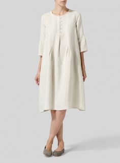 Linen Embroidered Hemline Dress Spring A-line Shirt Dress, Elegant A-line Dress With Relaxed Fit, Spring Tunic For Workwear, Elegant Spring Shift Shirt Dress, Elegant Shift Shirt Dress For Spring, Chic Spring Tunic For Workwear, Chic Spring Workwear Tunic, Elegant White Spring Tunic, Chic Neutral Linen Dress For Daywear