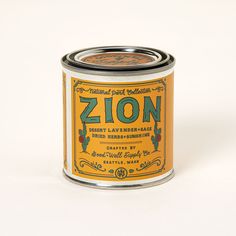 an orange tin with the word zon on it sitting in front of a white background