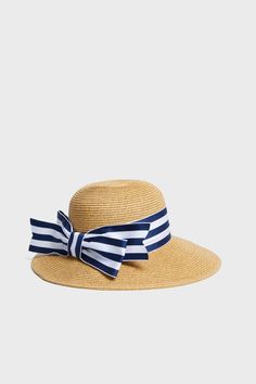 Exclusive Striped Packable Wide Bow Sunhat Sunhat With Ribbon, Chic Sun Hat With Bow For Vacation, Chic Vacation Sun Hat With Bow, Chic Straw Hat With Bow For Vacation, Chic Vacation Straw Hat With Bow, Chic Beach Sun Hat With Bow, Chic Boater Hat With Bow For Vacation, Summer Vacation Hat With Bow, Beach Boater Hat With Wide Brim And Bow