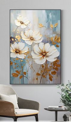 an abstract painting with white flowers on a blue and yellow background in a living room