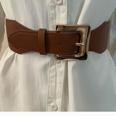 Brown Pu Leather Gold Tone Buckle Elastic Waistband Belt Color: Brown, Gold Tone Material: 50% Elastic, 50% Polyurethane Please Notice: White Shirt Is Not Included, Listing Is For The Belt Only. Warning: P65 (See Last Picture) All Measurements Are Approximate And Taken Laying Flat: Length: 29 1/2 Inches Length To Last Belt Hole: 27 1/2 Inches Width: 2 1/2 Inches Tags For Exposure: Western Wide Wide Belt Brown Belt Statement Belt Leather Location: Tote: #1 Trendy Adjustable Brown Belt, Adjustable Brown Faux Leather Belt, Brown Leather Party Belts, Brown Leather Belts For Party, Brown Leather Belt For Party, Chic Brown Belt For Party, Chic Brown Party Belt, Belt Hole, Statement Belt