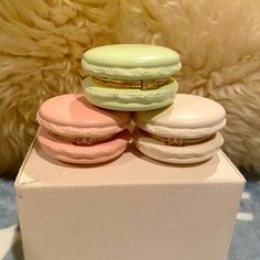 three macaroons are stacked on top of each other