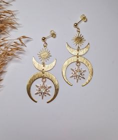 Crescent moon goddess dangle earrings - gold moon phase fewelry for a boho and chic look DETAILS: Metal Material: Stainless Steel and brass accents Length: 6 cm SHIPPING: We strive to dispatch your order promptly, ensuring timely delivery. Estimated delivery times after dispatch: - Netherlands: 1-3 days - Europe: 1-2 weeks - UK: 1-2 weeks - USA: Approximately 3 weeks Gift Wrapping Option: When placing your order, you can choose to have your earrings beautifully gift-wrapped, arriving in a jewelr Celestial Earring, Earring Star, Goddess Earrings, Star Earring, Earrings Moon, Celestial Earrings, Crescent Moon Earrings, Gold Moon, Moon Goddess