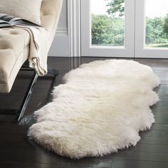 PRICES MAY VARY. [Perfect for any Room]: Available in sizes for any space, this rug is the pinnacle of luxurious style for rustic, boho, glam, farmhouse, contemporary, or transitional types of décor [Quality Product]: Genuine natural premium sheepskin pelt is undyed, unique, and unaltered from the slight variations that add organic qualities to your rug [Luxurious Pile]: Features a 3.4-inch comfortable and luxurious flowing pile thickness for cushioned fluffy softness underfoot Safavieh has been White Shag Rug, White Runners, Rustic Glam, Sheep Skin, Fur Rug, Sheepskin Rug, White Area Rug, White Rug, Cool Rugs