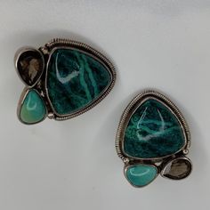 Vintage Mars And Valentine One Of A Kind Clip Earrings By Margaret Thurman Echo Of The Dreamer Statement Earrings Have A Base Stone Of Chrysocolla Malachite Perfectly Matched In Grain And Detail Accent Stones Of Sleeping Beauty Turquoise And Facet Cut Smoky Topaz Sterling Base And Details 1.25"H X 7/8"W Excellent Used Condition Smoky Topaz, Sleeping Beauty Turquoise, Clip Earrings, Statement Earrings, Clip On Earrings, Mars, The Dreamers, Sleeping Beauty, Topaz