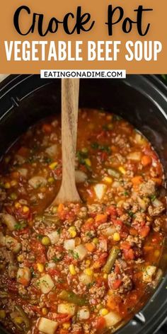 the crock pot vegetable beef soup is ready to be eaten