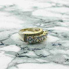 This stunning five-stone ring beautifully showcases a blend of elegance and sophistication. Each stone is expertly set in high-quality 925 sterling silver, creating a harmonious balance of sparkle and shine. The carefully selected stones, whether they are gemstones or cubic zirconia, offer a radiant display that catches the light beautifully, making it a perfect accessory for any occasion. Handcrafted with care, this ring is not only a fashion statement but also a timeless piece of jewelry that Stone Ring Women, Ladies Ring, Zircon Ring, Women Ring, Ring Women, Silver Pieces, Stone Ring, Gift For Women, Rings Statement