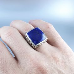 Classic and modern square cabochon blue Lapis Lazuli ring with Sterling silver. Unique gift for her or him, friend, girlfriend, wife, boyfriend, man September and December birthstone, 9 yeaar anniversary. The beautiful royal blue Lapis Lazuli is cut as a classic cabochon and set in Sterling silver with small dots of silver and 18k gold. All our stones are natural stones and our jewelry is handmade, very slight differences may occur in color and size. Our inlay work is all natural stone, NOT pressed stone dust. Please note the size specifications! Stone size: 17 x 17 x 5 mm We try to make our photos in daylight and sunshine, so that the colors remain unaltered. Nevertheless, there may be slight color differences between the item and the picture, especially as the colors are presented somewh Friend Girlfriend, Unique Gifts For Him, Lapis Lazuli Ring, Blue Lapis Lazuli, Blue Lapis, Modern Square, October Birthstone, Unique Gifts For Her, December Birthstone