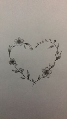 a drawing of a heart with flowers on it