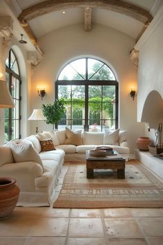 Airy Mediterranean beach house living room with sheer curtains and rattan furniture Living Room Mediterranean, Mediterranean Living Rooms, Mediterranean Living Room, Living Room Rustic