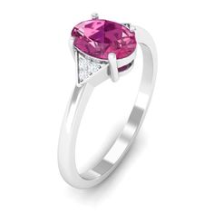 Product Details This exquisite solitaire ring features a stunning oval shaped pink tourmaline stone. The pink tourmalines beautiful hue adds a pop of color and vibrancy to the ring, while the Diamond trio on either side of the center stone provides a touch of sparkle and glamour. With its understated design and stunning gemstone, this ring is perfect for everyday wear or special occasions. It also makes a thoughtful and memorable gift for a loved one. Product Information SKU SHP-RINGS082220453 Weight 2.08 gm (Approximate) PINK TOURMALINE INFORMATION No.of Stones 1 Pieces Total Weight 1.10 Carat (Approximate) Dimension(approx) Oval-6X8 mm-1 Pcs Color Pink Cut Brilliant Shape Oval Setting Type Prong-Setting Quality Grade AAA DIAMOND INFORMATION No.of Stones 6 Pieces Total Weight 0.04 Carat ( Pink Tourmaline Rings With Gemstone Accents, Pink Tourmaline Rings For Gift, Pink Round Tourmaline Jewelry, Pink Round Cut Tourmaline Jewelry, Fine Jewelry Tourmaline In Pink, Tourmaline Stone, Ring With Diamond, Pink Tourmaline, Solitaire Ring