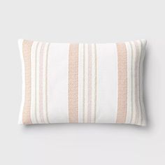 an orange and white striped pillow