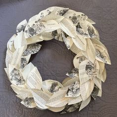 a wreath made out of old book pages