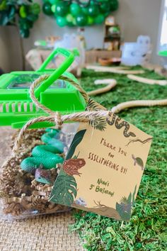 a table topped with lots of green items