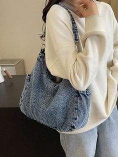 This Vintage Blue Distressed Slouchy Shoulder Bag is the perfect choice for college and work. Its stylish design and spacious interior make it ideal for everyday use. Made from high-quality materials, this bag is durable and long-lasting. Stay organized and effortlessly chic with this versatile bag. Color : Multicolor Details : Buckle, Drawstring Bag Size : Medium Style : Casual, Minimalist Type : Hobo Bag Strap Type : Adjustable Pattern Type : Letter, Plain, Textured Pattern Closure Type : Zipp Diy Bags From Old Clothes, Jean Bag, My Style Bags, Diy Bag Designs, Diy Bags Patterns, Denim Purse, Denim Shoulder Bags, College Work, Denim Tote Bags