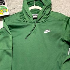 Brand New Nike Hoodie. No Tags, Never Been Worn. Deep Forest Green Color Very Comfortable. Size Small. Green Sporty Hoodie With Ribbed Cuffs, Sporty Green Sweatshirt With Kangaroo Pocket, Nike Green Athleisure Hoodie, Green Fleece Athleisure Hoodie, Green Fleece Hoodie In Athleisure Style, Green Athleisure Sweatshirt With Kangaroo Pocket, Green Hoodie With Kangaroo Pocket For Sports, Nike Crew Neck Hoodie For Winter, Nike Green Athleisure Sweatshirt