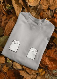 Halloween Ghost Sweatshirt, Halloween Boo Sweatshirt, Funny Halloween Sweatshirt, Halloween Ghost, Halloween Sweatshirt It is time to join the Cozy Club with the perfect statement sweatshirt or tee. With the right message, our quirky sweatshirts can become anyone's voice. Simple, elegantly minimal with vivid designs. Snag one to add to your loungewear collection, or find the perfect gift for friends and family.  Throw on these pieces for an effortless and totally adorable daily look. Casual chic Trendy White Halloween Sweatshirt, Spooky White Cotton Sweatshirt, White Cotton Spooky Sweatshirt, Halloween Cotton Pre-shrunk Sweatshirt, Unisex Cotton Halloween T-shirt, Funny Sweatshirts, Halloween Boo, Halloween Sweatshirt, Daily Look