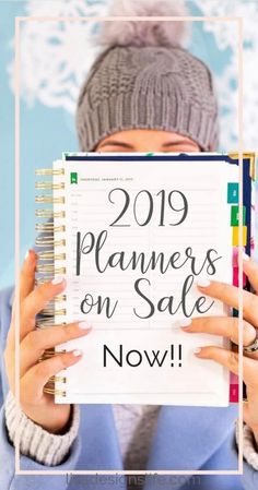 a woman holding up a planner with the words 2019 planners on sale now